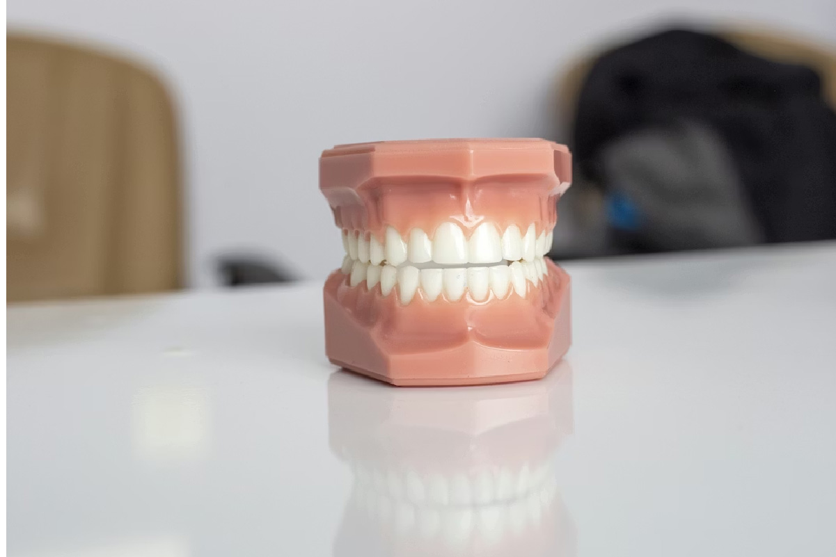 Dentist examining teeth at Soul Dental Varsity Lakes